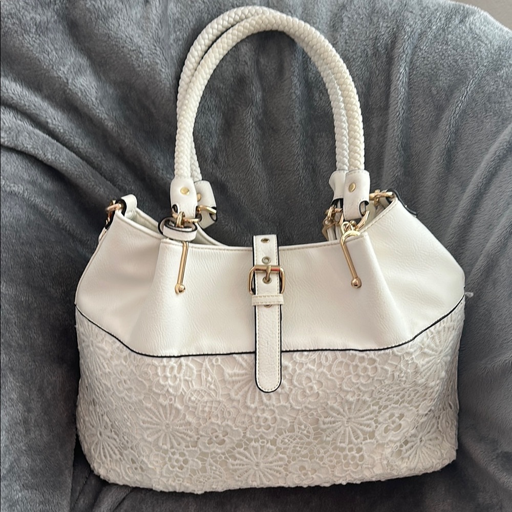 Black Rivet White Shoulder Bag with Rounded Shape and Metallic Closure